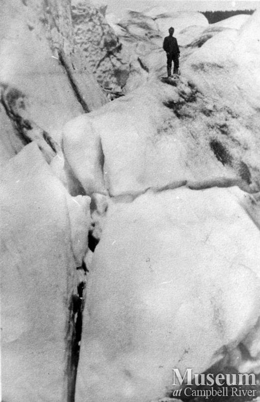 August Schnarr standing on Kleena Kleene glacier