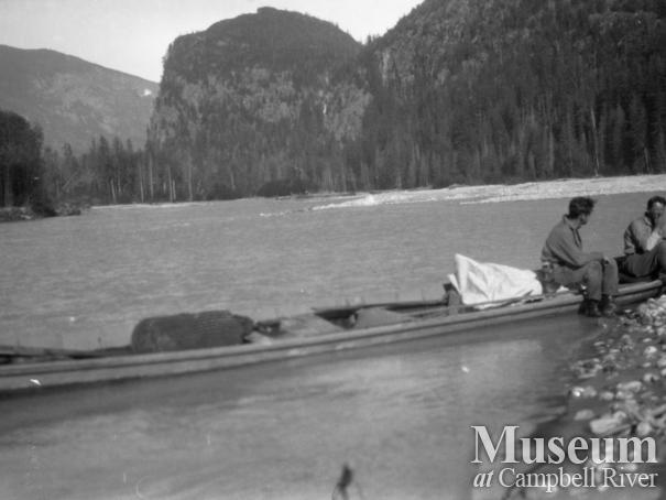 MacDonald and Hill in one of August Schnarr's river boats