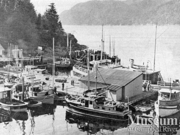 Boats tied up at the wharf at the Landing, Stuart Island
