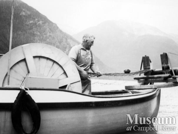 Angus Kerr hauling in his gillnet while fishing in Toba Inlet
