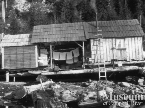 August Schnarr’s float house on beach either at Phillips or Frederick’s Arm