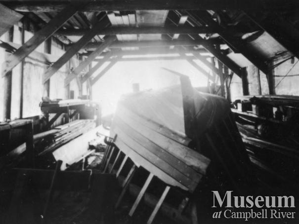 A boat under construction in August Schnarr's boat shed	