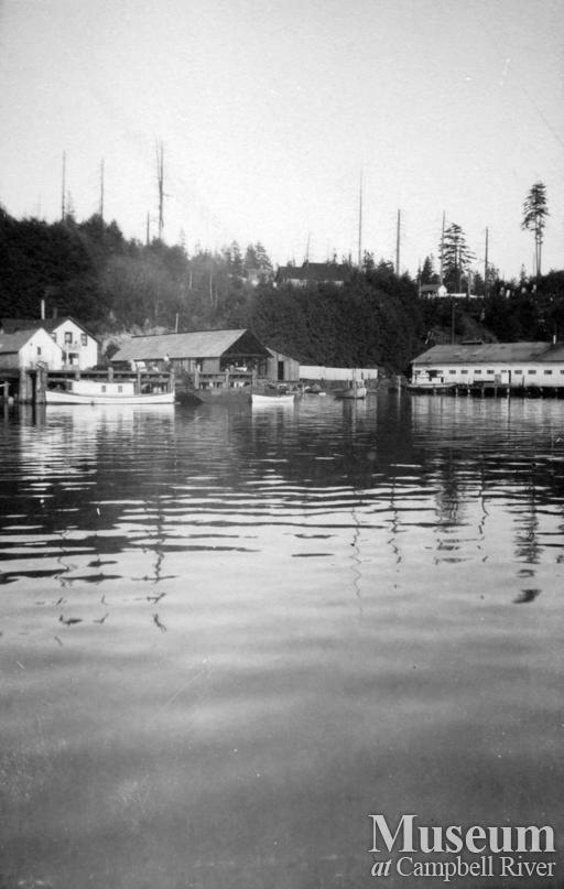 View of Quathiaski Cove  showing the sawmill (on left) and Cannery (on right)