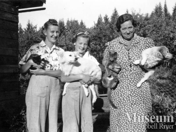 Gerrad family members with their pets, Heriot Bay